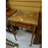 An Edwardian inlaid mahogany envelope card table with baize lining