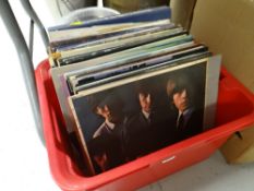 A tub of mainly rock & pop LP records including Rolling Stones, The Beatles, Simon & Garfunkel &