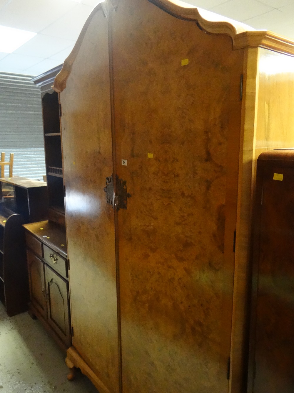 A two-door polished vintage wardrobe