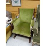 An unusual nineteenth century mahogany armchair in green upholstery