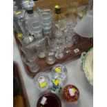 A quantity of glassware including paperweights, lead crystal glasses, a dimple scotch whisky