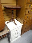 A modern three-drawer chest & an Italian-style marquetry tripod table together with a red plush