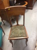 Set of four Edwardian mahogany fan back dining chairs