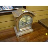 A mantel clock with brass dial (distressed)