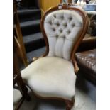 A reproduction spoon back chair