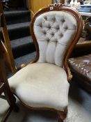 A reproduction spoon back chair