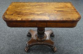 A FINE QUALITY ROSEWOOD VICTORIAN FOLDOVER CARD TABLE on an excellent claw footed shaped platform-