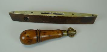 AN ANTIQUE BRASS MOUNTED WOODEN SPIRIT LEVEL by J. Rabone & Sons of Birmingham together with a frui