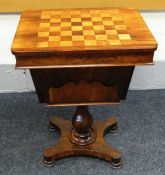 A VICTORIAN CHEQUER-TOP ROTARY GAMES TABLE in rosewood & satinwood over a shaped platform-base,