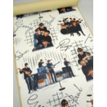 THIRTEEN ROLLS OF THE BEATLES WALLPAPER by Crown, each roll believed to be approx 760cms Provenance: