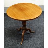 A NINETEENTH CENTURY MAHOGANY TILT-TOP TRIPOD TABLE of plain form on cabriole supports with turned