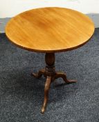 A NINETEENTH CENTURY MAHOGANY TILT-TOP TRIPOD TABLE of plain form on cabriole supports with turned