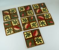 A SET OF SEVEN NINETEENTH CENTURY COPELAND POTTERY TILES each with four floral panels, 15 x 15cms