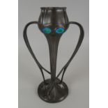 A SOLKETS FOR LIBERTY PEWTER TULIP-SHAPED VASE in the Art Nouveau style with four enamel medallions,