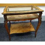 A FRENCH KINGWOOD BIJOUTERIE TABLE mounted with gilt metal decoration having floral marquetry to