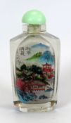 A CHINESE INSIDE-PAINTED GLASS SNUFF BOTTLE with green stopper, 9cms high