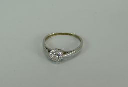 AN OLD ROUND CUT DIAMOND SOLITAIRE RING, with split shoulders in two claw settting, visual