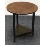 NINETEENTH CENTURY OAK CRICKET TABLE having a platform base and circular top, 60cms diam