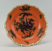 A MASON'S IRONSTONE PLATE of crimped rim in orange ground and featuring a gilded and deep blue