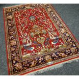 A RED GROUND TREE OF LIFE RUG 182 x 133 cms