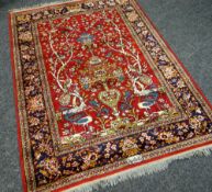 A RED GROUND TREE OF LIFE RUG 182 x 133 cms