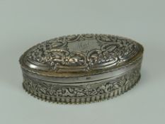 A LATE VICTORIAN OVAL SILVER DRESSING TABLE BOX with hinged lid and inscribed Mabs to a centre cart