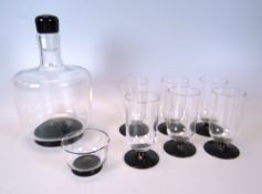 AN EIGHT-PIECE GLASS LIQUOR SET by Orrefors (Simon Gate) comprising decanter, six glasses &