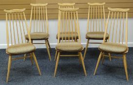 A SET OF SIX ERCOL BLONDE KITCHEN CHAIRS with tapering spindle backs