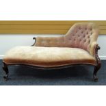 A VICTORIAN CHAISE LONGUE with button back & serpentine carved frame in mahogany