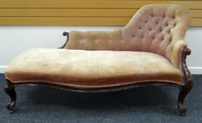 A VICTORIAN CHAISE LONGUE with button back & serpentine carved frame in mahogany