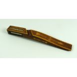A NINETEENTH CENTURY TREEN KNITTING SHEATH of curved form with marquetry inlay and five inset glazed