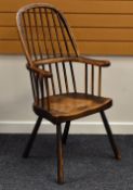 AN ELM WINDSOR-STYLE FARMHOUSE CHAIR having splayed supports & two-stage spindle and hoop back