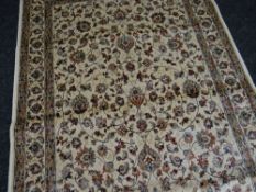 IVORY GROUND KASHMIR RUG with all over design, 170 x 117cms
