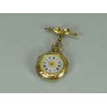 A 15K BRIGHT-CUT YELLOW GOLD OCGAGONAL FOB-WATCH with decorative enamel dial, Swiss made, with