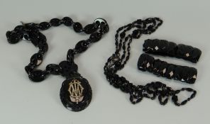 A PARCEL OF BLACK JET JEWELLERY including necklet with seed pearl centre-piece, two expander