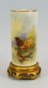 A ROYAL WORCESTER CYLINDRICAL VASE DECORATED BY HARRY STINTON with Highland cattle watering, the