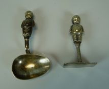AN EPNS INFANT SPOON with baby-figural handle & matching pusher (consignment from BBC Bargain Hunt)
