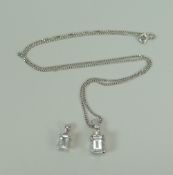 AN 18CT WHITE GOLD FINE NECKLACE WITH TWO AQUAMARINE PENDANTS, one with diamond finial, 6gms