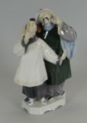 A ROYAL COPENHAGEN PORCELAIN MODEL OF TWO CHINESE FIGURES in traditional clothing, on an Oriental