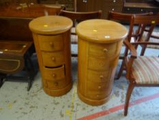 Pair of modern circular four drawer drum style chests