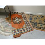 A large modern patterned rug together with an Oriental wool pile rug & a Chinese washed hearth rug