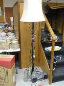 Vintage black painted wrought iron standard lamp with shade, two soda syphons, Sony radio cassette