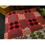 Red ground geometric patterned Welsh blanket