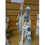 Lladro figure of a lady with parasol and a Lladro design figure