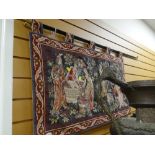 Medieval style tapestry on a fleur-de-lys hanger