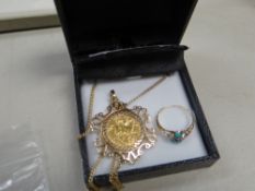 Gold full sovereign on a nine carat gold filigree mount and necklace together with a turquoise and