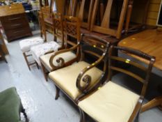 Trio of inlaid mahogany chairs and a pair of dining chairs including one carver