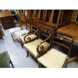 Trio of inlaid mahogany chairs and a pair of dining chairs including one carver