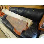 Black three seater leather sofa