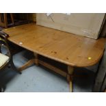 Extending pine dining table